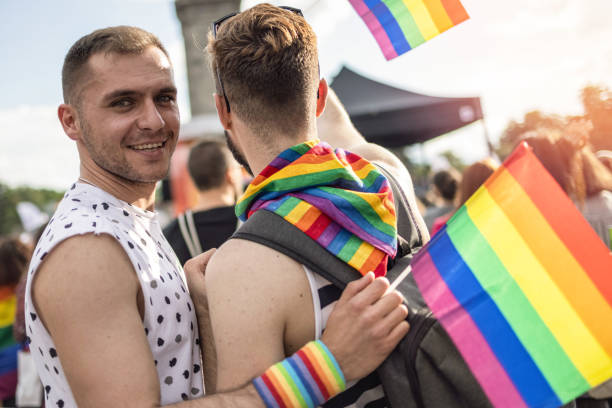 istock Men at the LGBTQ pride parade 1327449327