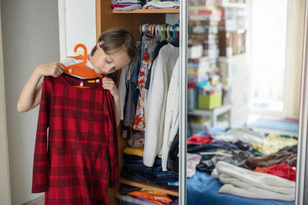 istock Girl getting dressed up for school 1327449339