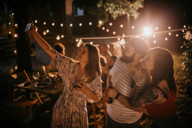istock Friends taking a selfie on party in back yard 1327450431
