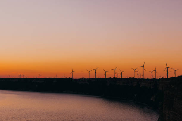 istock Sunset Landscape by the sea with Wind turbines 1327451081