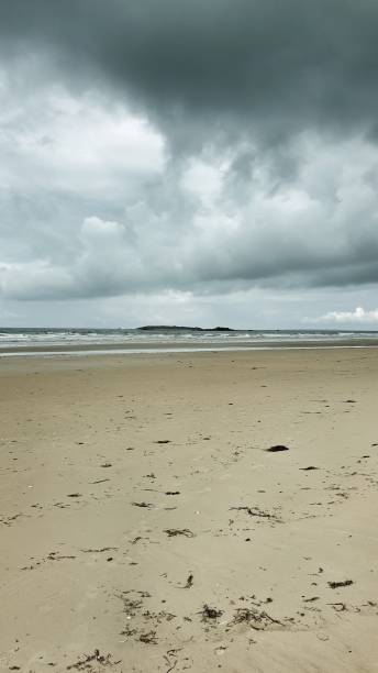 istock The sky is clouding over the coast 1327451400