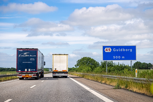 Two trucks blocking a highway at Lolland one of the larger Danish islands.