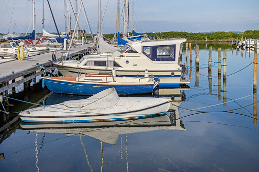 Small boats for hunting water birds in the small harbor of Kragenæs at Lolland. The harbor faces the archipelago south of Zealand.