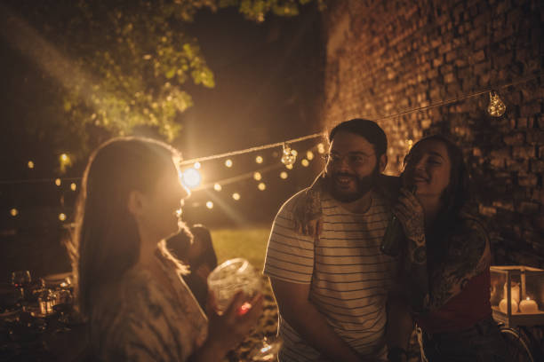 istock People on party in back yard 1327457597