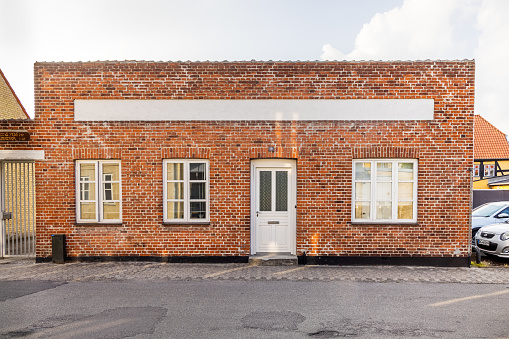 Small brick house in the center of Nakskov which is the main city on the Danish island Lolland