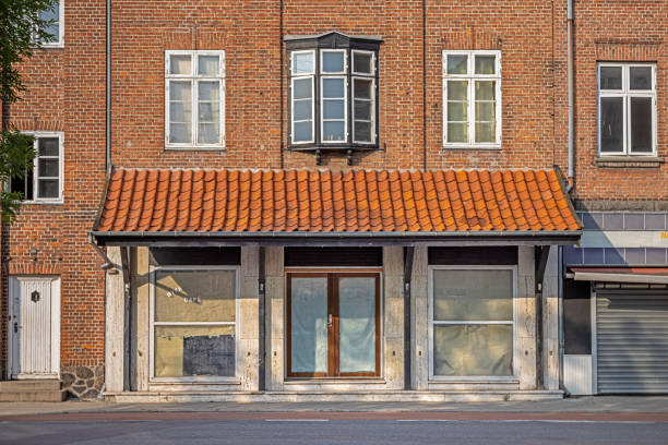 Closed and bankrupt shop in Nakskov which is the main city on Lolland a large island in Denmark which has been in recession during the last decades