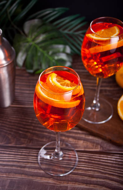 istock Spritz Italian cocktail alcoholic beverage with ice cubes and oranges. 1327459346