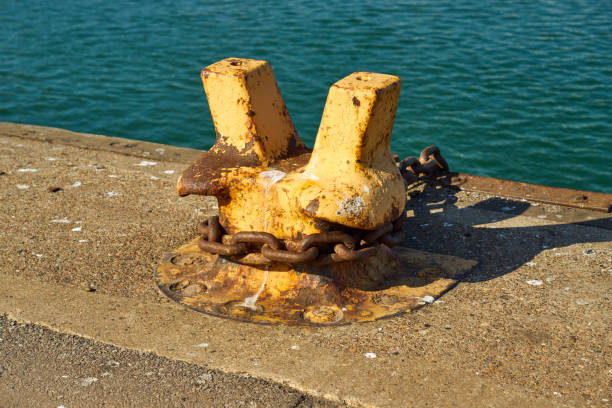istock A twin horn mooring bollard with a heavy chain around it 1327459636