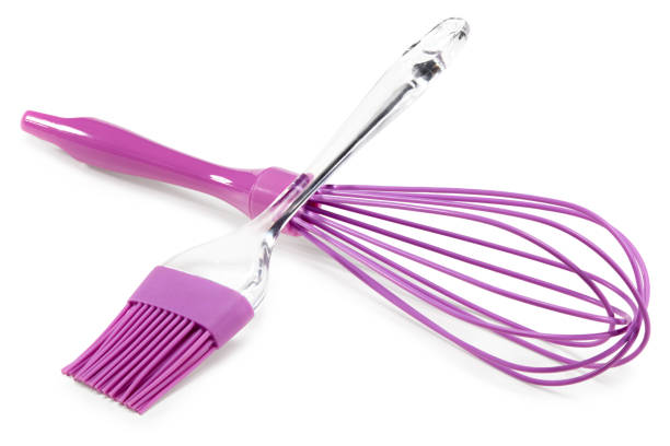istock violet balloon whisk for mixing for cooking. clipping path 1327463503