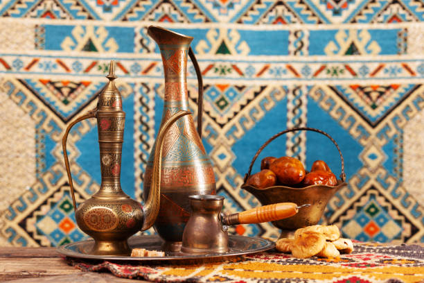 istock still life with a middle eastern coffee pot, pitcher and fruits 1327463881