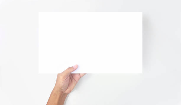 istock Hands holding paper blank for  letter paper 1327468106