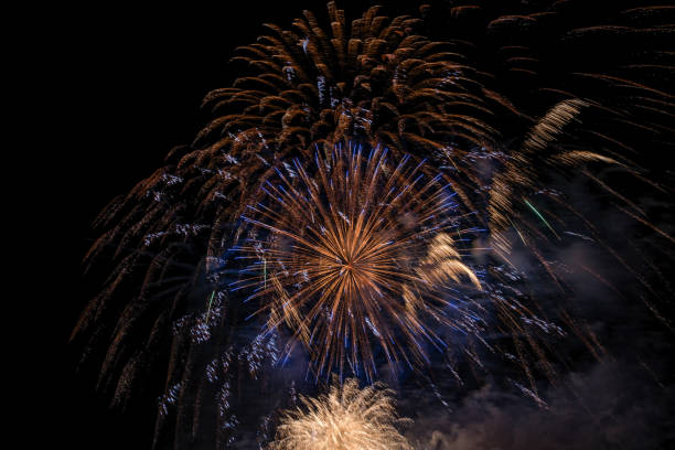 istock Fireworks light up the sky with smoke. Colorful. 1327475579