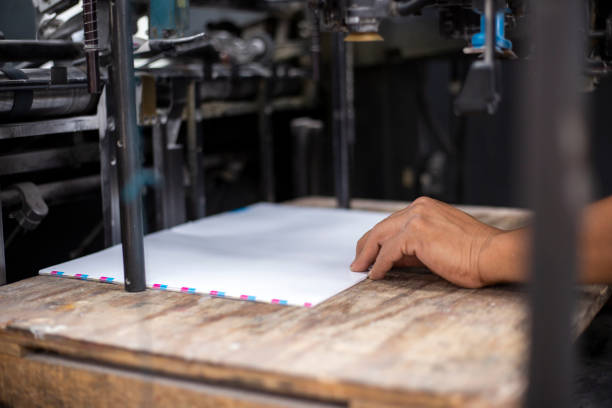 istock Young woman working in a printing press 1327475761