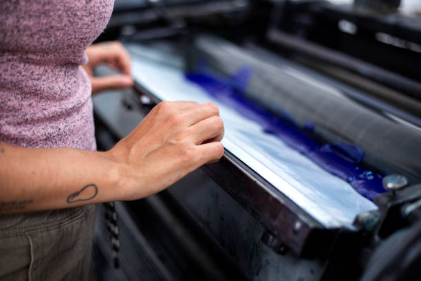 istock Young woman working in a printing press 1327475803