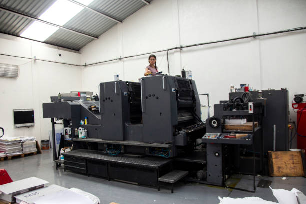 istock Young woman working in a printing press 1327475872