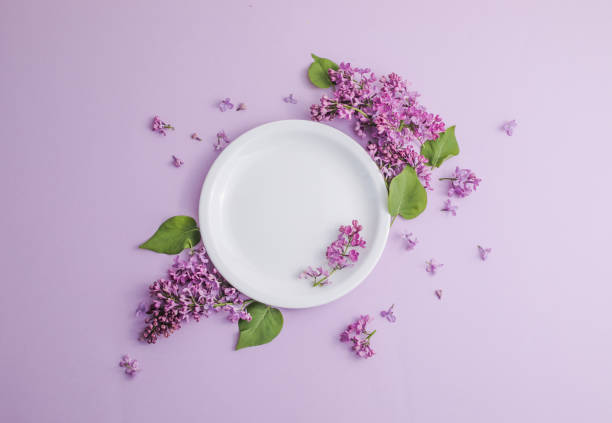 istock Rustic table setting with lilac flowers on light table. Holidays decoration on Provence style. Romantic dinner. Flat lay with copy space for text 1327479126