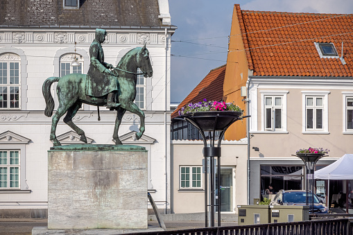 Statue of the Danish king Christian X (1870-1947) made by the sculptor Victor Kvedéris (1909 - 1966) and is placed in the center of Nakskov which is the main city on the Danish island Lolland