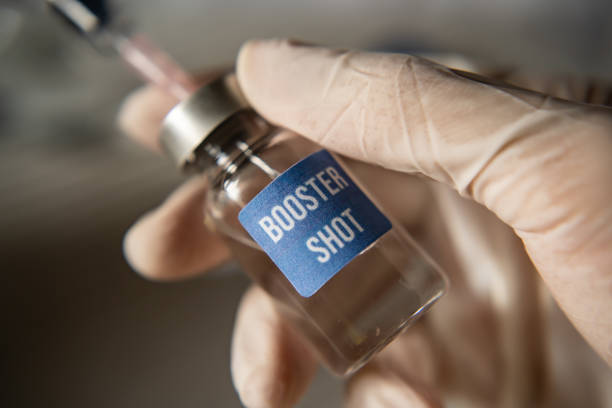 Covid-19 booster shot vaccine concept Covid-19 booster shot vaccine concept rocket booster photos stock pictures, royalty-free photos & images