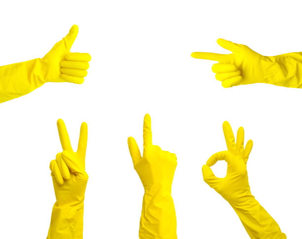 mãos em luvas de borracha amarelas mostram diferentes gestos isolados em um fundo branco - kitchen glove - fotografias e filmes do acervo
