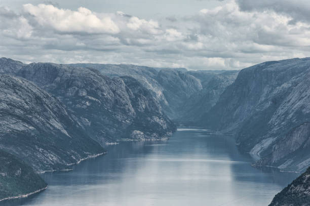 istock Norway Landscape. Preikestolen. River and Mountain. Blue sky. 1327485477