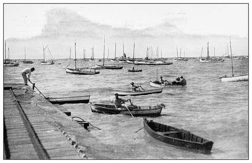 Antique black and white photograph of people from islands in the Caribbean and in the Pacific Ocean; Cuba, Hawaii, Philippines and others: Sponge boats, Cuba