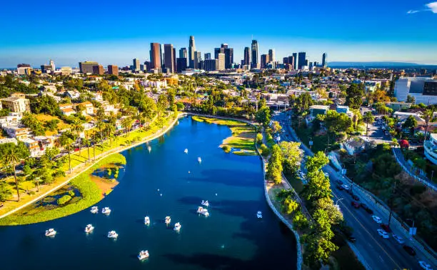 Aerial drone views above a gorgeous perfect summer day in Los Angeles California USA with Cityscape Skyline background