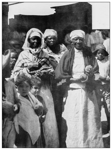 istock Antique black and white photograph: old Cuban people 1327488044