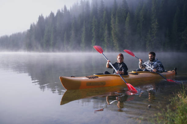 istock Couple Is Exploring Nature With Kayak. 1327489335