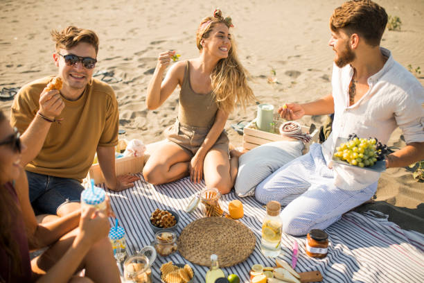 istock Pleasant beach picnic with my friends 1327494340