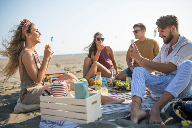 istock Pleasant beach picnic with my friends 1327494902