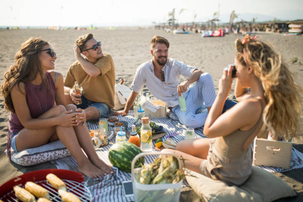 istock Pleasant beach picnic with my friends 1327494998