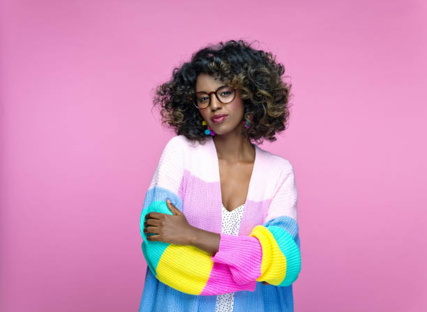istock Confident woman wearing rainbow cardigan 1327495172