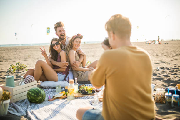 istock Pleasant beach picnic with my friends 1327495185