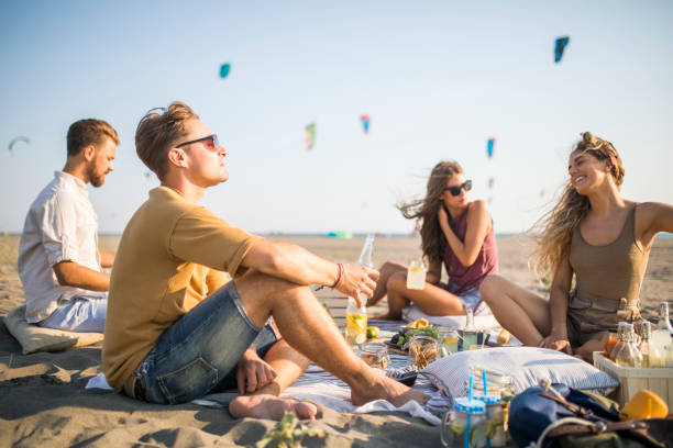 istock Pleasant beach picnic with my friends 1327495249