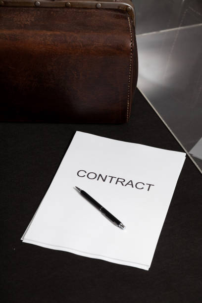 istock Contract and leather carpetbag close-up 1327495410