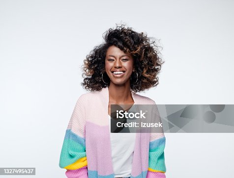 istock Excited woman wearing rainbow cardigan 1327495437