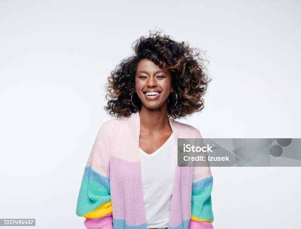 Excited Woman Wearing Rainbow Cardigan Stock Photo - Download Image Now - Women, One Woman Only, People