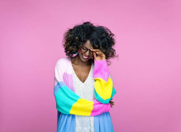 istock Excited woman wearing rainbow cardigan 1327496406