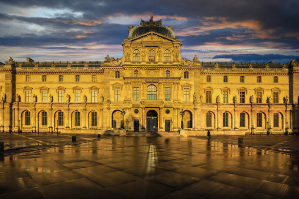 Paris - France, May 5, 2019 : Louvre museum at twilight in winter, this is one of the most popular landmark in Paris