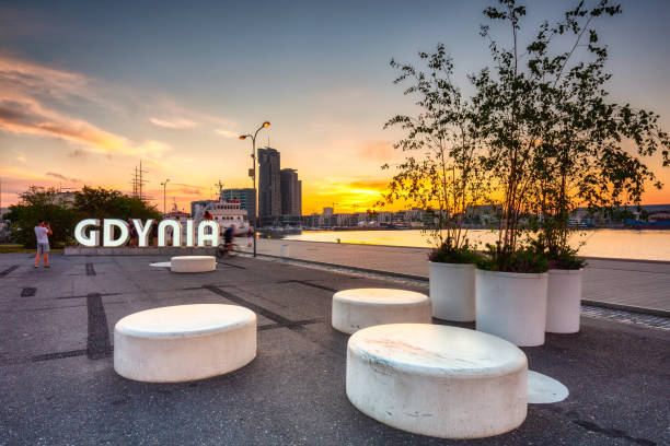 istock Gdynia city inscription at sunset 1327506128