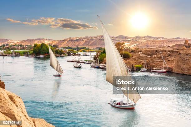 Traditional Nile Sailboats Near The Banks Of Aswan Egypt Stock Photo - Download Image Now