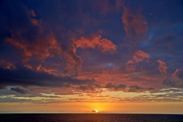 istock sun rise over the ocean 1327514706