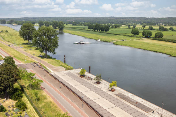 istock Aerial view Dutch village Cuijk along river Meuse 1327515023