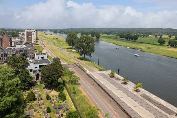 istock Aerial view Dutch village Cuijk along river Meuse 1327515033