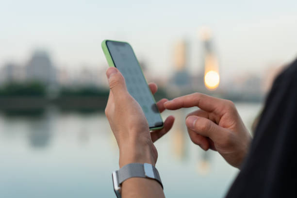 istock One hand is dialing on the phone 1327515270
