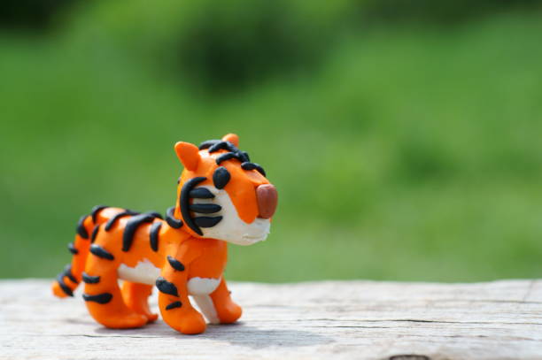 istock Tiger figurine made of plasticine close-up. 1327516370