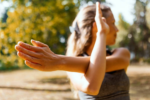Flexible young woman practicing yoga