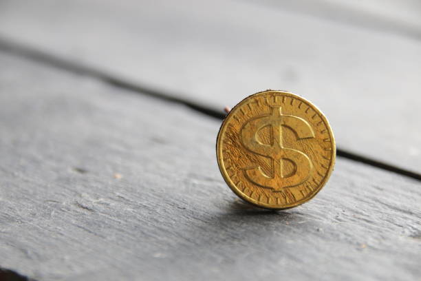 istock golden dollar on vintage background 1327517971