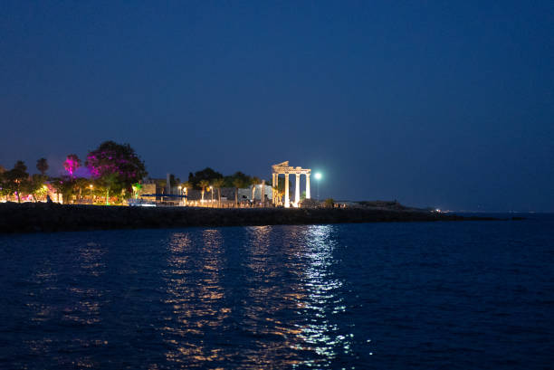Side harbor view from the sea at night