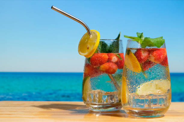 istock Two hard seltzer cocktails on summer beach 1327522697